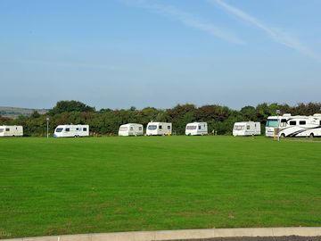 Tent and touring pitch with optional electric