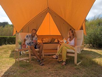 Couple sitting at the tent