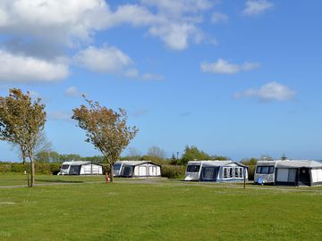 Views of the touring field - grass and hardstanding, all with electric
