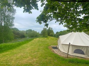 Bell tent situated lakeside in cut meadowland which offers abundance of wildlife and privacy. (added by manager 22 may 2023)