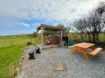 Hot tub and outdoor seating area