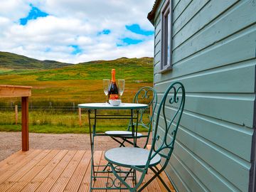 Bistro table and chairs for outdoor dining on the decking (added by manager 13 oct 2022)