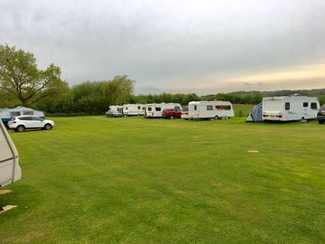 Spacious site with 17 grass pitches. all have wifi and electric hook-up