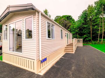 Caravan with private wrap-around decking