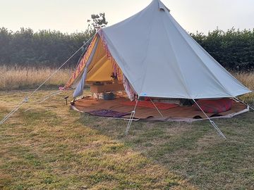 Sides of the bell tent can fold up to allow air through