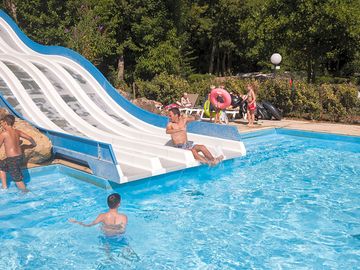 Swimming pool with waterslides