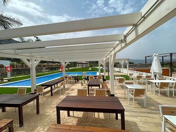 Terrace alongside the pool