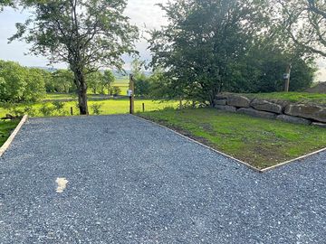 Serviced touring pitch with far-reaching views