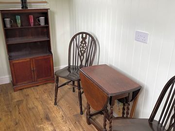 Table and chairs in the shepherd's hut