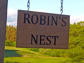 Signpost next to the hut