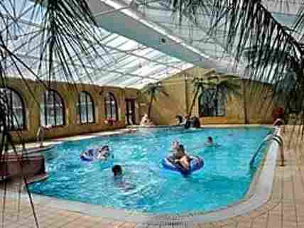 FREE: Indoor heated pool with slide.