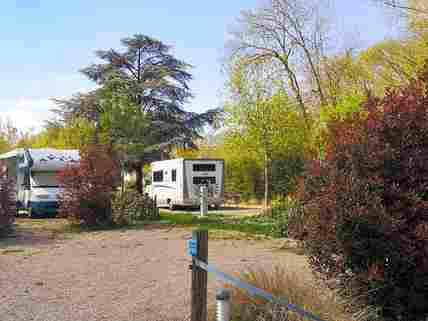 Hardstanding and grass touring pitch with water, sewer and electric hook-ups.