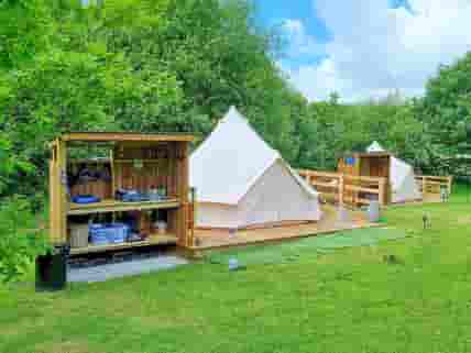 Bell tents with private outdoor kitchens