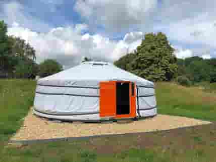 Orange yurt and gravel terrace