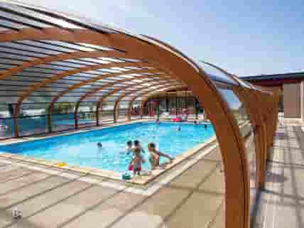 Heated and covered swimming pool for all
