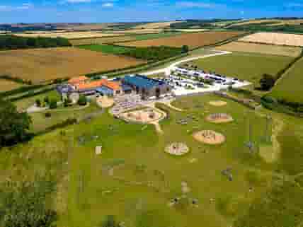 Aerial view of the site and Adventure Play at William's Den (tickets sold separately)