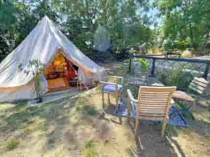 Venus bell tent with outdoor seating area