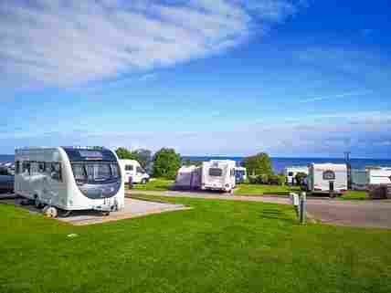 Dog friendly touring caravan sites best sale near beach