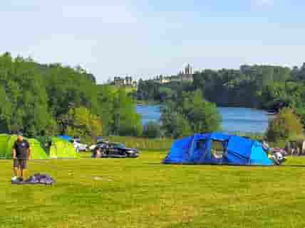 Camping field overlooking Castle Howard and lake.