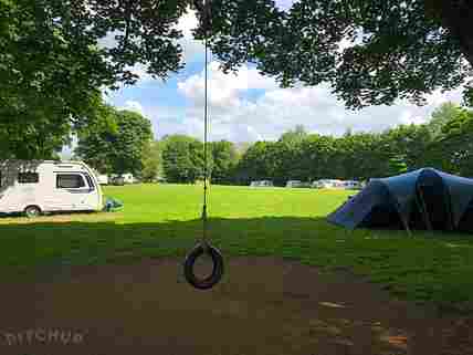 Grass pitches and swing for the kids