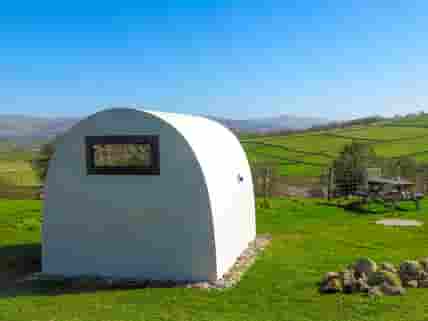 Camping pods with views of Ingleborough