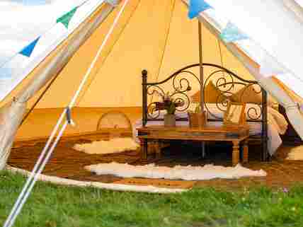 Bell tent with real bed at Orchard View Farm