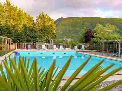 Swimming pool with hill views