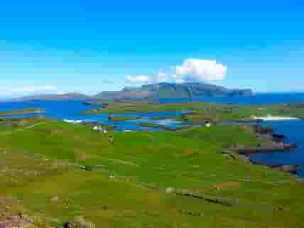 Isles of Canna, Sanday and Rum from above Canna Campsite.