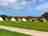 Menallack Farm Caravan and Camping Site: Looking at the bell tents and camping pods.