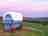 West Kellow Yurts: The sun setting over Polperro, a 15-minute walk down the hill