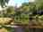 Camping Moulin de la Barde: Your pitch right alongside the Creuse river