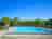 Centro Vacanze Garden River: Swimming pool with grass sun terrace