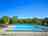 Centro Vacanze Garden River: Swimming pool with grass sun terrace