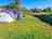 Clapton Farm Caravan and Campsite: Visitor image of the massive tent set up next to the river