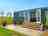 Serenity Lakes: Stunning location with sculptural firepit and private patio