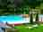Le Manoir De Bezolle: View of the pool with sun loungers
