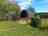 Meadow View Campsite: Log pod and picnic table