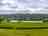 Graythwaite Camping: View across the camping field to the lake (photo added by manager on 08/10/2023)