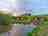 Portesham Pods: View across the lake to both pods (photo added by manager on 20/05/2025)