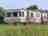 Yet-Y-Gors Campsite and Fishery: 6 berth caravan outside 