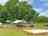 Arlington Campsite: Communal barbecue area with covered seating (photo added by manager on 06/23/2025)