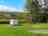Daisy Bank Touring Park: View over valley to Shropshire Hills from Meadow