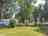 Camping de l'Île: Large pitches shaded by trees