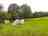 Hurstwood Farm: Visitor image of the view across site towards the pods and their tent (photo added by manager on 27/09/2022)
