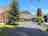 Castrum Thermal Camping: Main entrance to the courtyard with apartment building