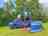 Mill Paddock Campsite: Grassy pitches surrounded by trees (photo added by manager on 06/23/2025)