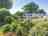 Island Lodge: Flower bed and pitches