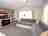 Southfork Caravan Park: Sitting room area with TV and fire