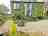 Oakfields Holiday Accommodation: Picnic bench in front of the shepherd's hut