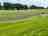 Oakwood Campsite: View across the pitches (photo added by manager on 11/10/2023)